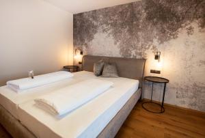 Ένα ή περισσότερα κρεβάτια σε δωμάτιο στο Saldur Small Active Hotel