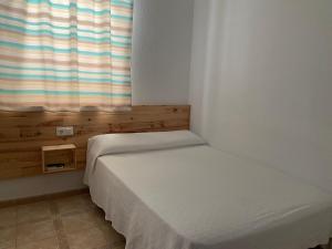 Postel nebo postele na pokoji v ubytování Hostal Barbate