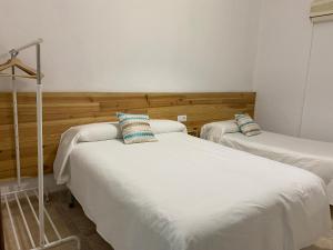 Postel nebo postele na pokoji v ubytování Hostal Barbate