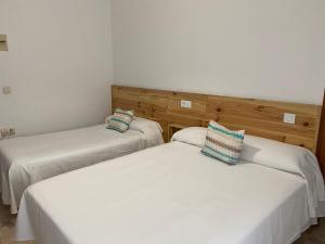 Postel nebo postele na pokoji v ubytování Hostal Barbate