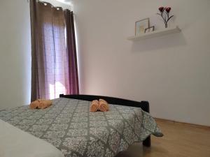 Postel nebo postele na pokoji v ubytování Apartman Memories
