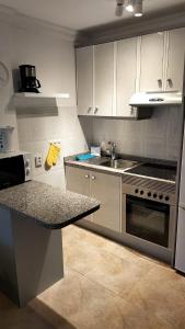 Kuchyňa alebo kuchynka v ubytovaní Sunny Apartment Teneguia by Yumbo