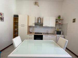 Kuchyň nebo kuchyňský kout v ubytování Sette Note Guest House
