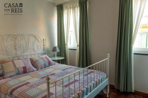 Кровать или кровати в номере Casa Dos Reis - Boutique Hostel