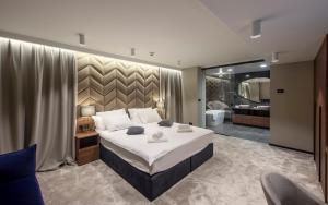 Postel nebo postele na pokoji v ubytování Hotel Turist