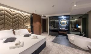 Postel nebo postele na pokoji v ubytování Hotel Turist
