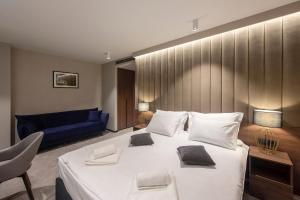 Postel nebo postele na pokoji v ubytování Hotel Turist