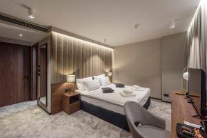 Postel nebo postele na pokoji v ubytování Hotel Turist