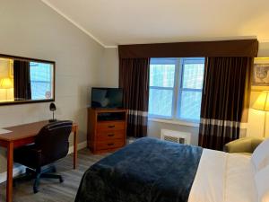 Postel nebo postele na pokoji v ubytování Hill Top Motel