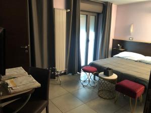 Posteľ alebo postele v izbe v ubytovaní Villa Camilla Milano