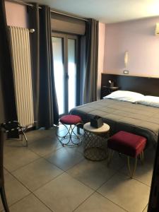 Posteľ alebo postele v izbe v ubytovaní Villa Camilla Milano