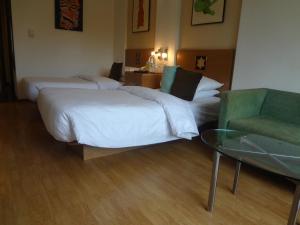 Katil atau katil-katil dalam bilik di Lemon Tree Hotel, Ahmedabad