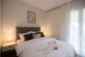 Postel nebo postele na pokoji v ubytování Casa Del Sol Corfu Old Town Apartment