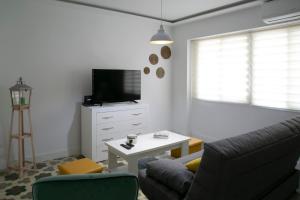 Televízia a/alebo spoločenská miestnosť v ubytovaní Apartamento en el centro de Úbeda - Plaza Andalucía