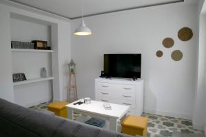 Televízia a/alebo spoločenská miestnosť v ubytovaní Apartamento en el centro de Úbeda - Plaza Andalucía