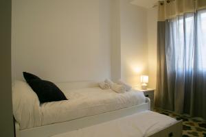 Posteľ alebo postele v izbe v ubytovaní Apartamento en el centro de Úbeda - Plaza Andalucía