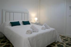 Posteľ alebo postele v izbe v ubytovaní Apartamento en el centro de Úbeda - Plaza Andalucía