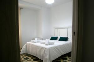Posteľ alebo postele v izbe v ubytovaní Apartamento en el centro de Úbeda - Plaza Andalucía