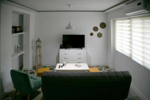 Televízia a/alebo spoločenská miestnosť v ubytovaní Apartamento en el centro de Úbeda - Plaza Andalucía