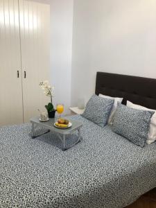 Posteľ alebo postele v izbe v ubytovaní Acogedor piso en Chio 1-B WIFI