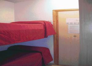 Ein Etagenbett oder Etagenbetten in einem Zimmer der Unterkunft Aparthotel Condor