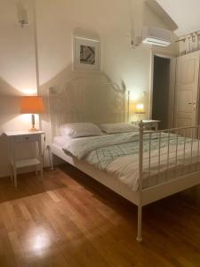 Postel nebo postele na pokoji v ubytování B&B LUCHICHI