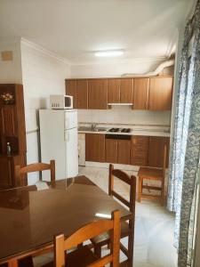 Kuchyň nebo kuchyňský kout v ubytování Apartamento Conileño con Terraza