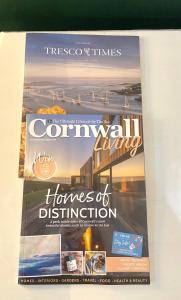 a magazine cover of the homes of distinction at Stunning ANNEXE 1 luxury bedroom, eating area & bathroom only! in Truro