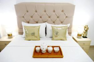Llit o llits en una habitació de Ecusuites Playas Suite 3 Preference Balcón & Jacuzzi Vista al Mar