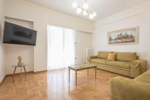 TV a/nebo společenská místnost v ubytování Victoria Majestic Suites Apartments