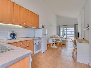 Kuchyň nebo kuchyňský kout v ubytování Mahostly Bungalow Vista Golf