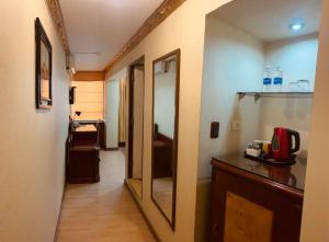 Kuchyň nebo kuchyňský kout v ubytování Hotel Oro Inn