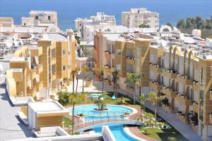 an aerial view of a resort with a swimming pool at Residence Les Dunes POOL VIEW 3 Bedroom Apartment in Sousse