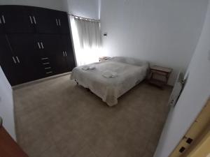 Ένα ή περισσότερα κρεβάτια σε δωμάτιο στο Casa de descanso
