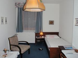 Posteľ alebo postele v izbe v ubytovaní Hotel-Restaurant Moser Pöchlarn