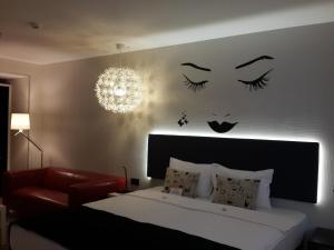 מיטה או מיטות בחדר ב-Tempo Fair Suites