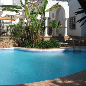 Bazén v ubytovaní Hotel Residencia Miami alebo v jeho blízkosti