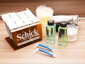 a table with a box of chalk and some toothbrushes at Hotel Route-Inn Hakata Ekimae -Hakataguchi- in Fukuoka