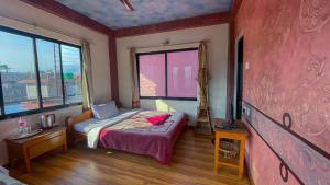A bed or beds in a room at Hotel Hakoniwa