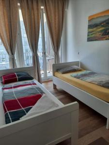 Cama ou camas em um quarto em High-Quality in the heart of Stuttgart 4