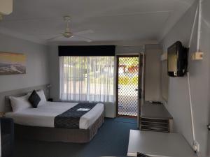 Haven Waters Motel & Apartments客房内的一张或多张床位