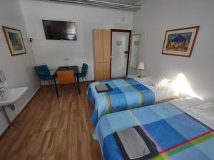 Postel nebo postele na pokoji v ubytování Hotel 24 - Karihaara - Kemi