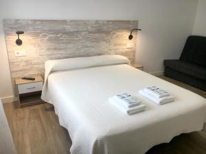 Postel nebo postele na pokoji v ubytování Casa Rural Doña Carmen + 37 fotografií