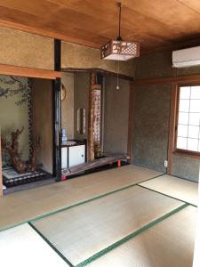 an empty room with a mats on the floor at Oyado Endo - Vacation STAY 12914v in Sanuki