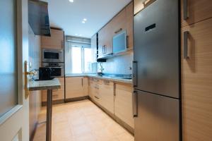 Kuchnia lub aneks kuchenny w obiekcie Magno Apartments Paseo de la O - Private Parking included