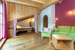 Łóżko lub łóżka w pokoju w obiekcie Brandstatthof Leogang