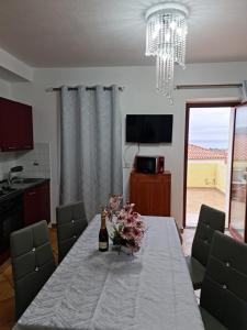 TV a/nebo společenská místnost v ubytování NordEst SeaView