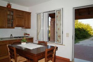 Kuchyň nebo kuchyňský kout v ubytování Agriturismo San Luigi
