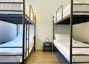 Poschodová posteľ alebo postele v izbe v ubytovaní Noclegi Pod Muflonem