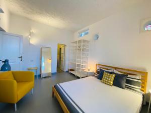 A bed or beds in a room at Via Marina